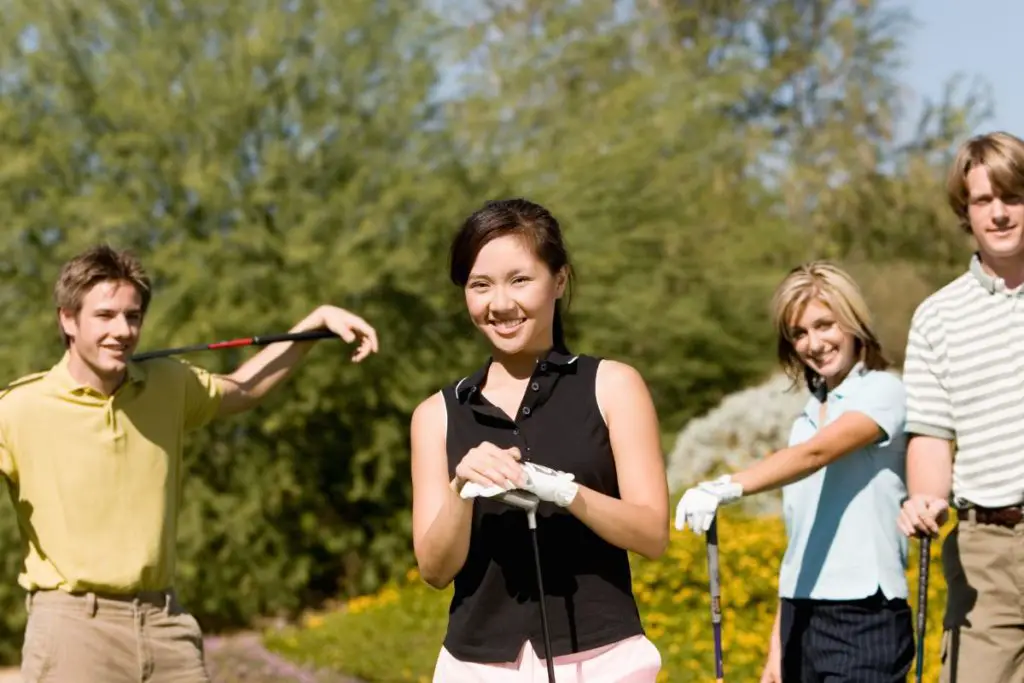 Friends golfing together