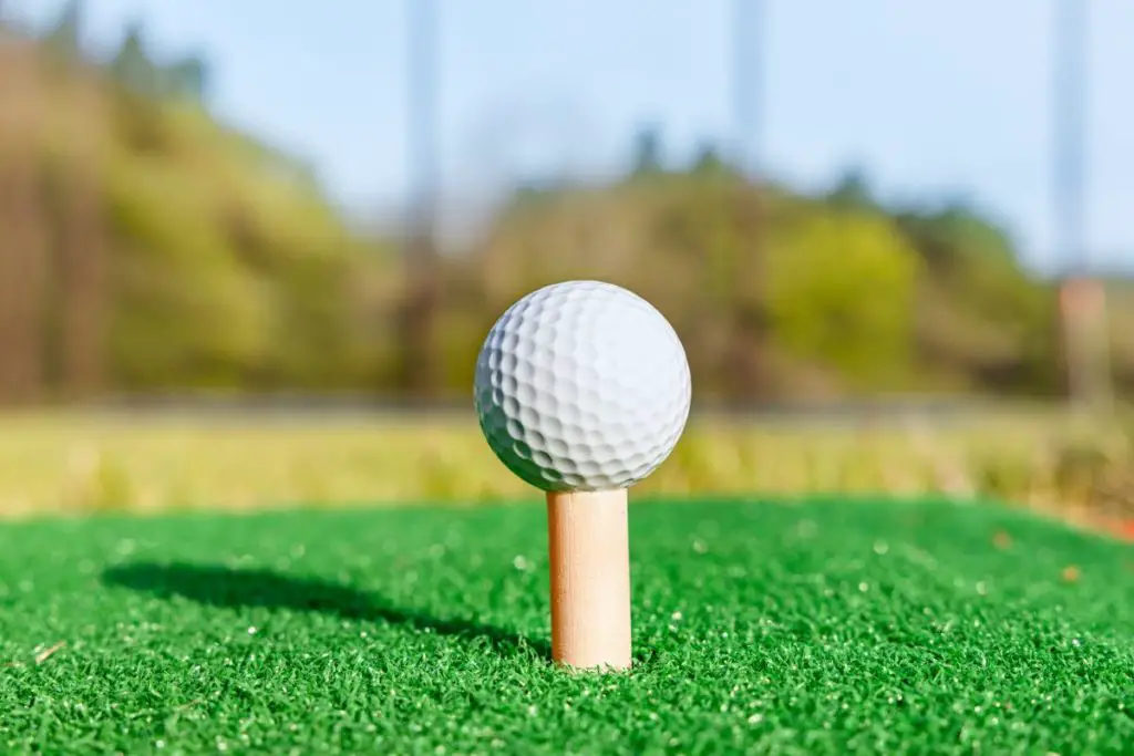 Golf tee and ball at Topgolf