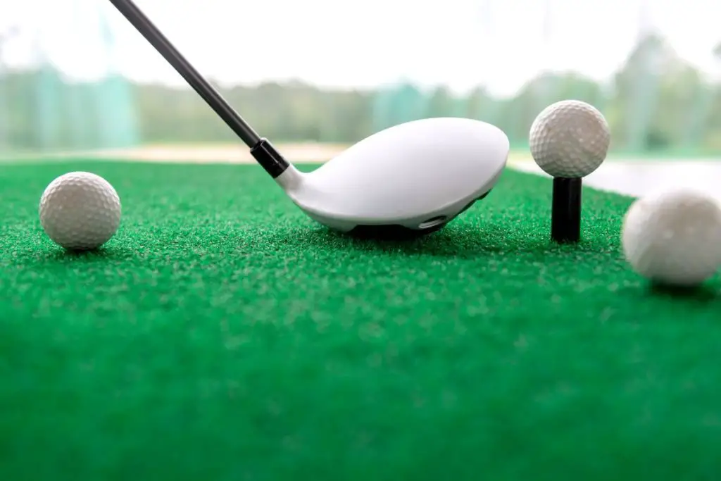 Person at Topgolf getting ready to hit the ball