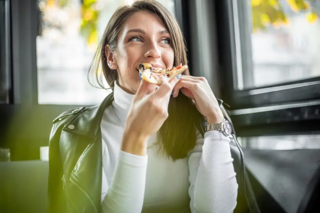 Woman eating at a restaurant